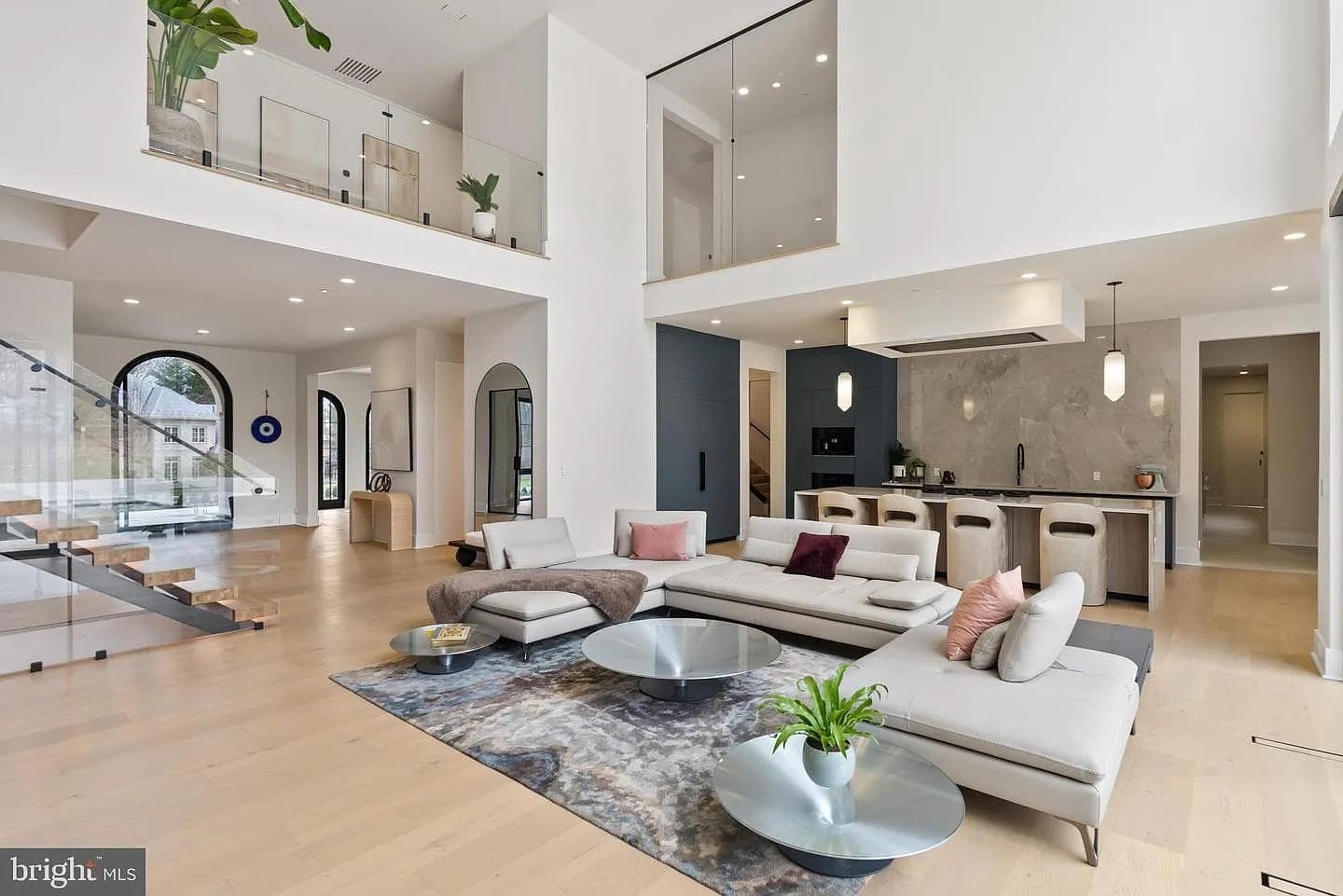 Open-concept main level living area and kitchen at the Bethesda Custom Modern Home